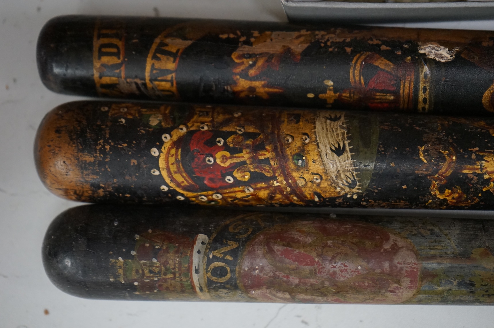 A Victorian Scottish Special Constable’s turned and painted wood truncheon, and two other Victorian Police truncheons, largest 46cm in length (3)